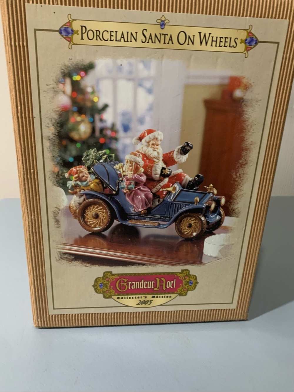 Porcelain Santa on Wheels - Blue and Red Holiday Figurine